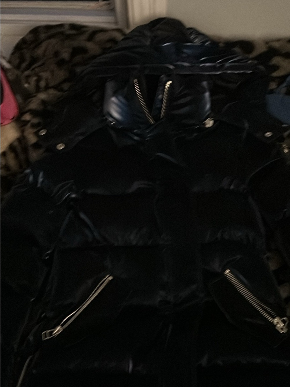 All wet navy woman’s puffer jacket